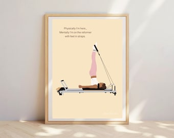 May include: A motivational quote about Pilates, "Physically I'm here... Mentally I'm on the reformer with feet in straps."  The quote is printed on a beige background with an illustration of a person doing a Pilates exercise on a reformer.