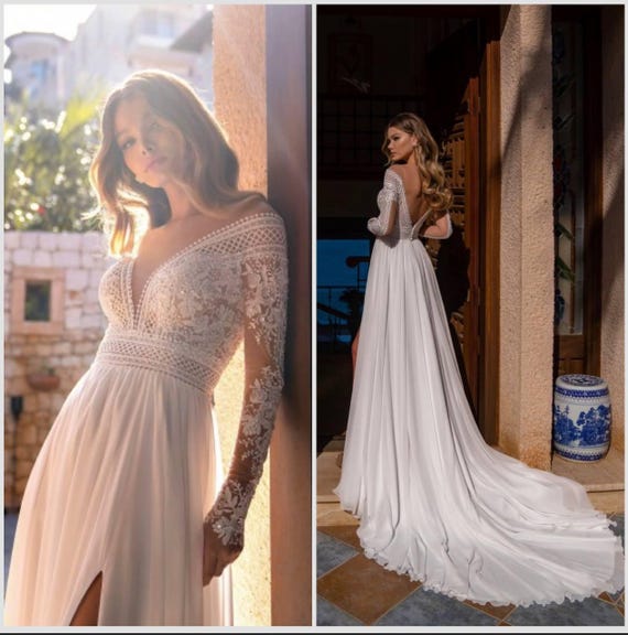 A-line lace wedding dress Deep V-neck bridal gown Long sleeve wedding gown Open back wedding dress Boho lace wedding gown Beach bridal gown