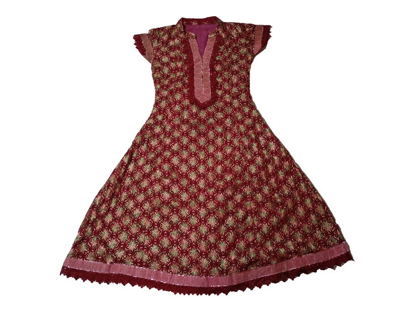 May include: A maroon dress with a floral pattern and lace trim. The dress has a V-neckline and short sleeves.