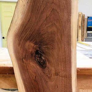 Black Walnut Wood Slab. 54" X 9.5-12.5" X 1 1/2 " Live-edge, Multi-Figured. Flattened, Planed, Vacuum-Kiln Dried.