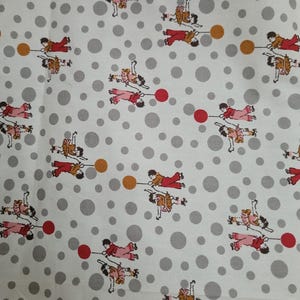 May include: White fabric with a repeating pattern of children holding red and orange balloons. The children are wearing red, pink, and blue clothing. The background is a white fabric with gray polka dots.