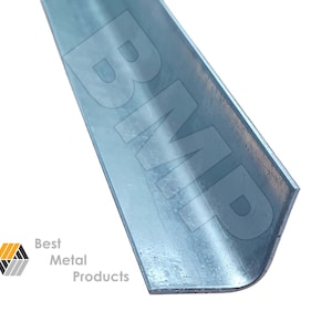May include: A silver metal angle, or corner, piece. The metal is slightly textured and has a slight sheen. The angle is 90 degrees.