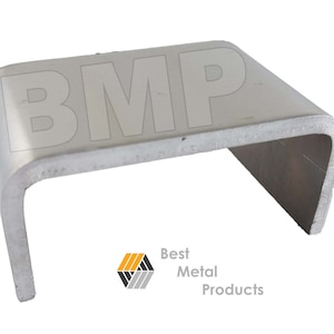 May include: A bent metal bracket with rounded corners. The bracket is silver and has the letters "BMP" printed on it. The logo for "Best Metal Products" is in the lower right corner.