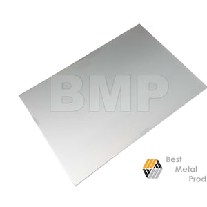 Puede incluir: Una l&aacute;mina de metal plateada con las letras BMP impresas en ella. La l&aacute;mina est&aacute; sobre un fondo blanco.