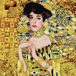 May include: A cross-stitch portrait of a woman in the style of Gustav Klimt. The artwork features a woman with dark hair, rosy cheeks, and red lips, adorned with gold and yellow patterns. The background is a mosaic of gold and geometric shapes.