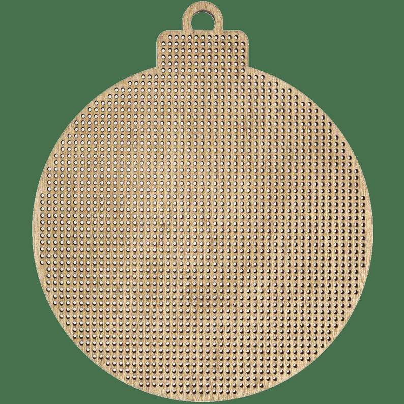 May include: A round wooden bauble with a hole at the top for hanging. The bauble is covered in a grid of small holes, creating a textured surface.