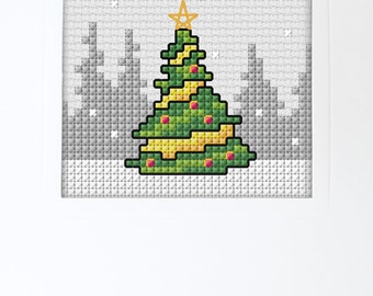 May include: A green pixelated Christmas tree with yellow and red ornaments and a gold star on top, against a white background with gray pixelated snowflakes.