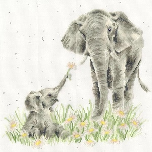 May include: Cross-stitch design featuring a mother elephant and baby elephant. The baby elephant is reaching for a flower held by the mother. The scene is set in a field of daisies, with a soft, neutral color palette.