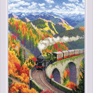 May include: A green steam train with red passenger cars travels over a stone bridge in a mountainous landscape. The trees are a mix of green, yellow, and orange, indicating autumn. The sky is blue with white clouds.