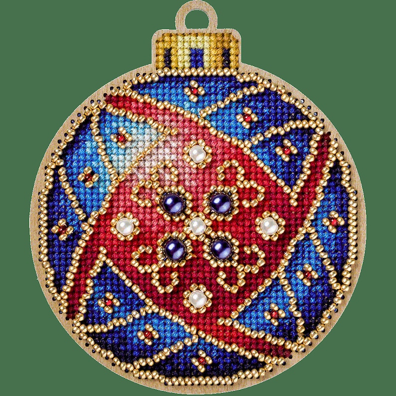 May include: A round, wooden Christmas bauble with a red, blue and gold beaded design. The bauble features a red and white beaded pattern with black and white beads in the centre.