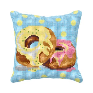 May include: A blue pillow with a white polka dot pattern features a cross-stitch design of two donuts. One donut is glazed with yellow icing and green sprinkles, while the other is glazed with pink icing.