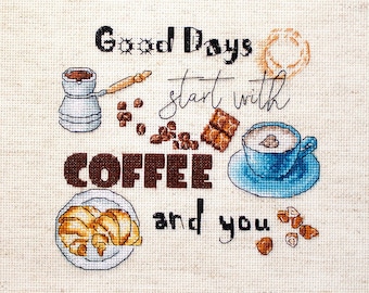 Puede incluir: Diseño de bordado de punto de cruz con una cafetera, granos de café, chocolate, una taza de café, croissants y avellanas. El texto dice "Good Days start with COFFEE and you".