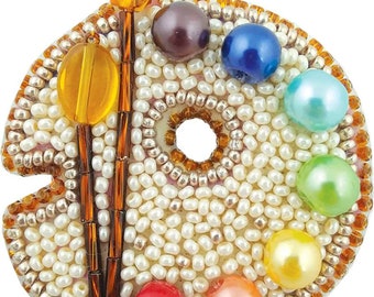 May include: A white beaded artist's palette with a brown paintbrush and colorful pearl beads in the shape of a rainbow.