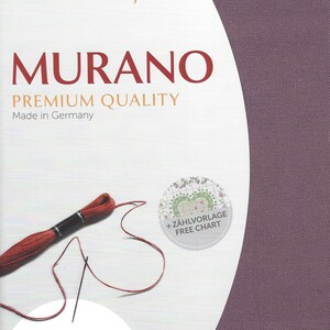 May include: Purple Zweigart Aida fabric with the text "Murano Premium Quality Made in Germany" and a red embroidery floss with a needle. The fabric is precut and measures 19 inches by 27 inches, or 48 cm by 68 cm. The count is 32 count, or 12.6 stitches per inch. The image also includes a small circle with the text "+ Z&Auml;HLVORLAGE FREE CHART".