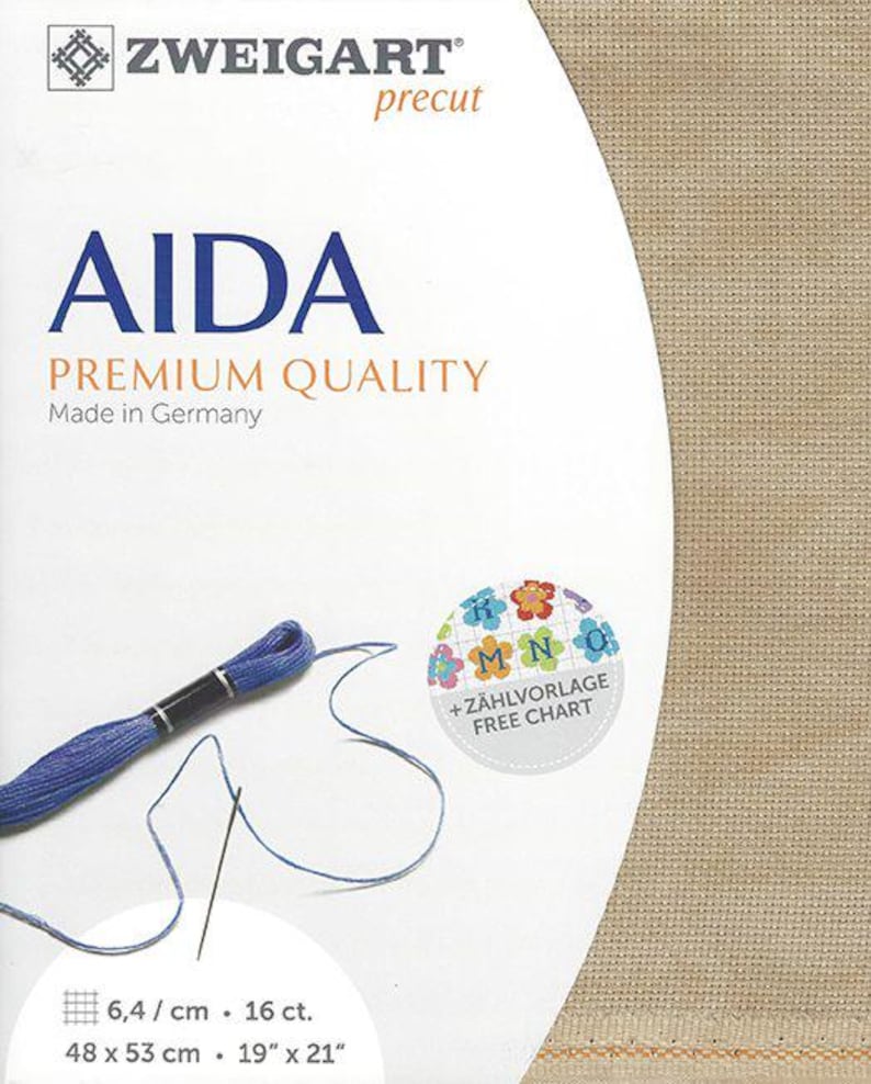 May include: A Zweigart precut Aida fabric package in a tan color. The packaging features the text AIDA PREMIUM QUALITY Made in Germany, a blue embroidery thread skein with a needle, and a circular graphic with the text +Z&Auml;HLVORLAGE FREE CHART.