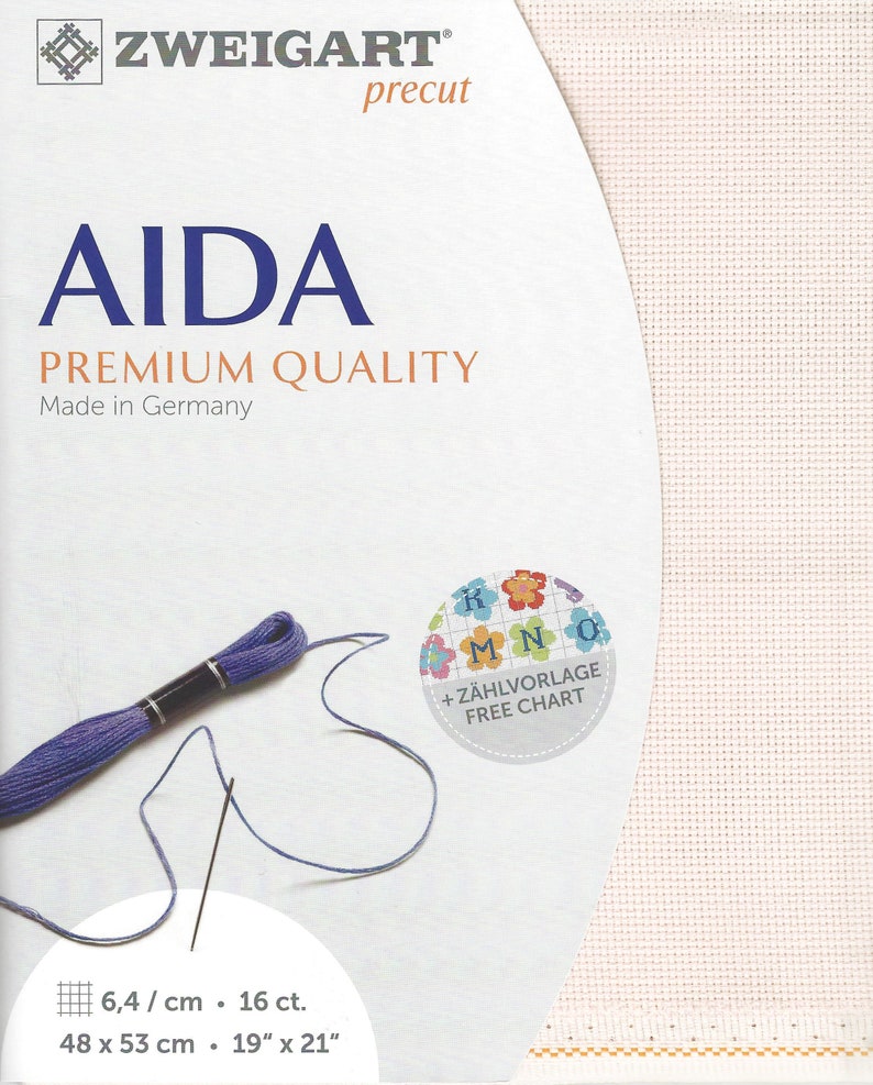 May include: Zweigart precut Aida premium quality fabric with a visible grid texture. The packaging features the text AIDA, PREMIUM QUALITY, Made in Germany, and a free chart icon. Includes a skein of purple embroidery floss and a needle, 16 ct.