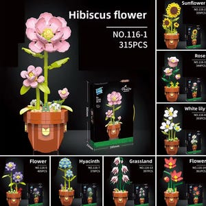 May include: A display of various flower building block sets. The main focus is on a pink hibiscus flower model in a brown pot. Other sets include a sunflower, rose, white lily, and other flower models. The text on the box reads "Hibiscus flower".