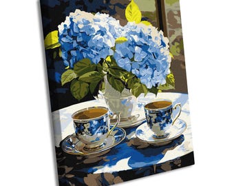 May include: A painting of a still life featuring two teacups with blue and white floral designs on a white tablecloth. A bouquet of blue hydrangeas in a white vase is in the background.