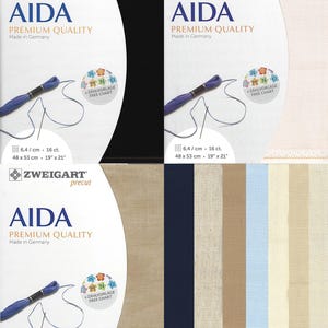 May include: Zweigart Aida premium quality fabric in black, white, and various neutral tones. Each package features the brand name, a blue embroidery thread skein, and a free chart sticker. Labels indicate 6.4 stitches per cm, 16 count, and 19 by 21 inches.