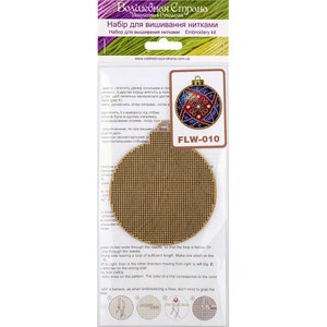 May include: A round, brown embroidery hoop with a grid pattern. The hoop is labelled "FLW-010" and is part of a craft kit for needlepoint. The kit includes instructions for making a Christmas ornament.