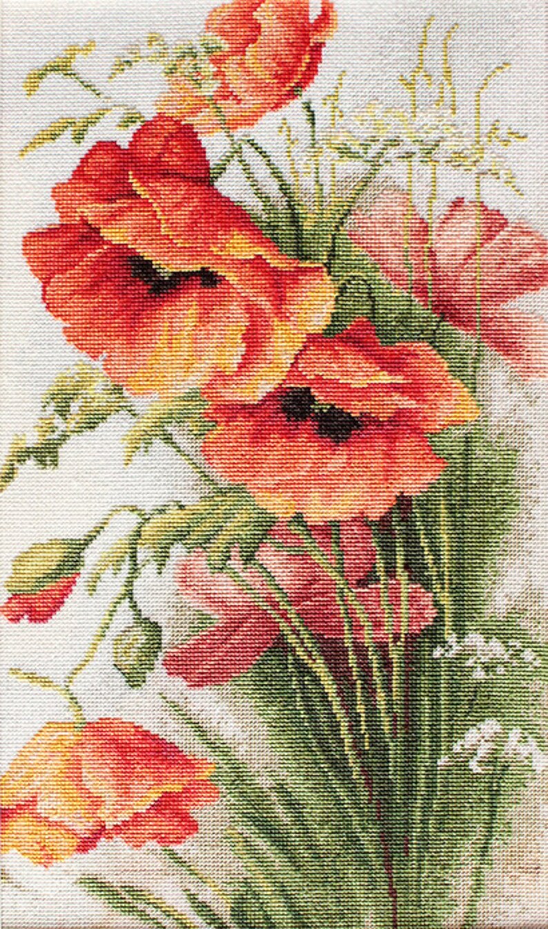 May include: Cross-stitch of a bouquet of red poppies with black centers, yellow accents, and green foliage. The flowers are in full bloom, with some buds visible. The background is white.