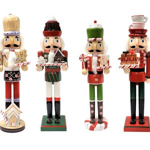 May include: Four decorative wooden nutcrackers in festive holiday attire. Each nutcracker is painted with bright colors and holds various items, including gingerbread men, houses, and candy canes. The nutcrackers stand on individual bases, perfect for Christmas decor.