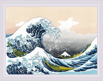 May include: A blue and white wave with a mountain in the background. The wave is crashing and there are whitecaps on top of it. The mountain is in the distance and is covered in snow. The sky is a light blue and there are clouds in the sky.