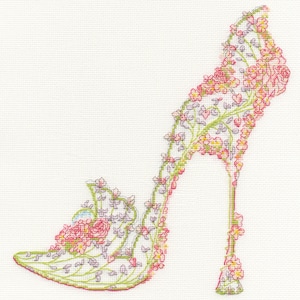 May include: A high-heeled shoe design created with pink, green and purple flowers. The shoe is outlined with a floral pattern.