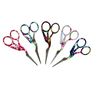 May include: Six pairs of colourful floral patterned scissors with silver blades. The scissors have a unique design with a curved handle.