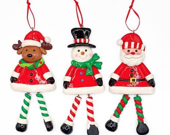 Adorno navideño brillante de Papá Noel, muñeco de nieve y reno con patas colgantes. Decoración navideña de Wizardi F07-N2-9-SAA202