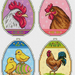 May include: Four colorful Easter egg-shaped ornaments with different designs featuring roosters and chicks. Each ornament has a white background with a colorful border and floral accents.