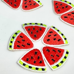 May include: Embroidered watermelon slice patches with red flesh, black seeds, and green and yellow rind. These patches are ideal for adding a fun, summery touch to clothing, bags, or accessories. The patches are small and detailed.