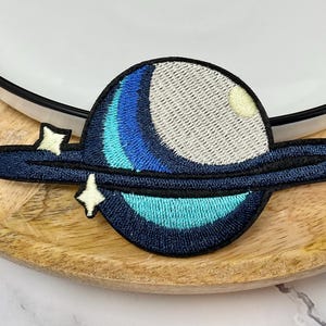 PIANETA SATURNO Toppa ricamata termoadesiva WandererTravelling Decorazione Ornamento Ornamento Natura Avventura Pianeta Saturno