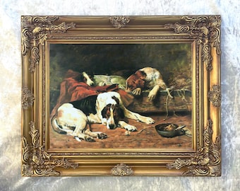 Stampa su tela con cornice decorata raffigurante cani da caccia a riposo.