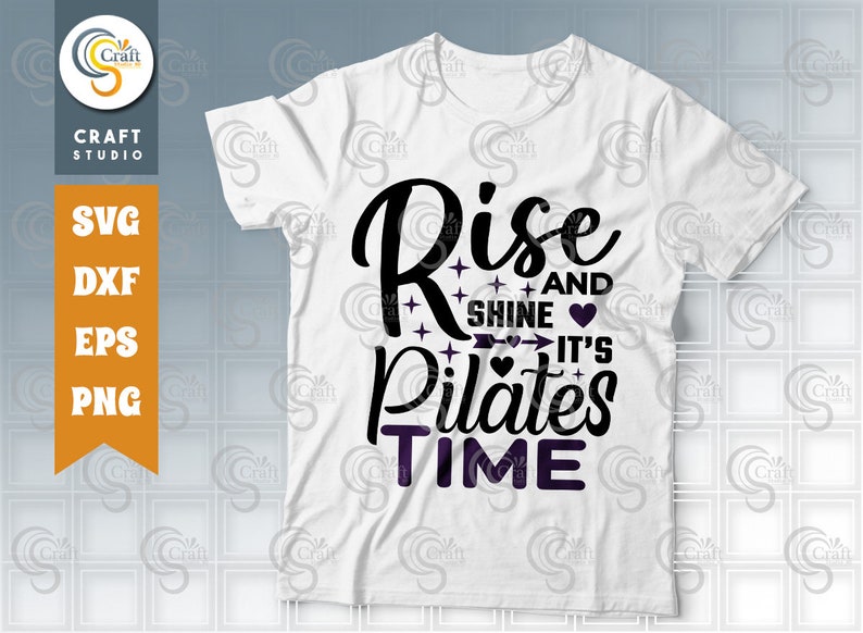 May include: White t-shirt with black text that reads "Rise and Shine It's Pilates Time". The text is decorated with hearts and stars.