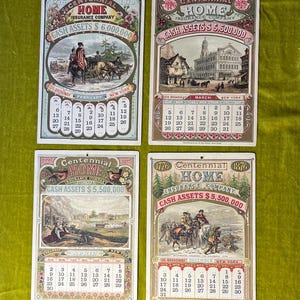 May include: Four vintage calendars from the Home Insurance Company, dating back to 1876. Each calendar features a different scene and month, with the company's name and cash assets prominently displayed. The calendars are printed on thick paper with a decorative border.