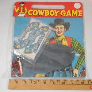 Póster de juego de fiesta para niños de los años 50: Ponle la pistola al vaquero (sin abrir)