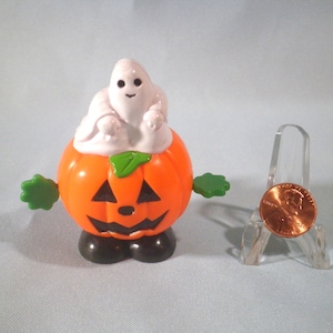 Vintage Halloween Fun World Wind-up Ghost on Pumpkin