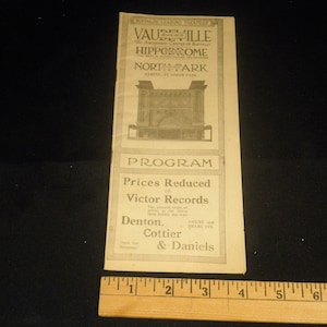 May include: A black and white programme for a vaudeville show at the North Park Hippodrome in Buffalo, New York. The programme advertises a show featuring Denton, Cottier & Daniels and reduced prices on Victor Records.