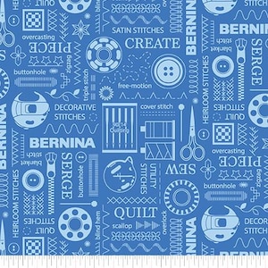 May include: Blue fabric with a repeating pattern of sewing-related icons and text, including scissors, spools, and the word "Bernina." The design also features words like "Quilt" and "Create."