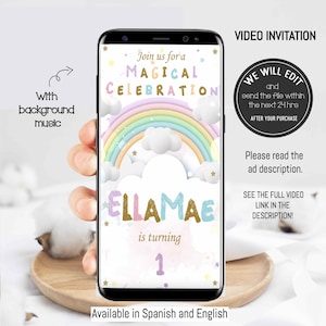 Puede incluir: Una invitación de video digital para una fiesta de cumpleaños con un arcoíris, nubes y estrellas. El texto dice "Únete a nosotros para una celebración mágica" y "Ella Mae cumple 1 año".