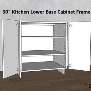 May include: A white 30-inch kitchen lower base cabinet frame with two doors and three shelves. The cabinet is open and the doors are partially open.