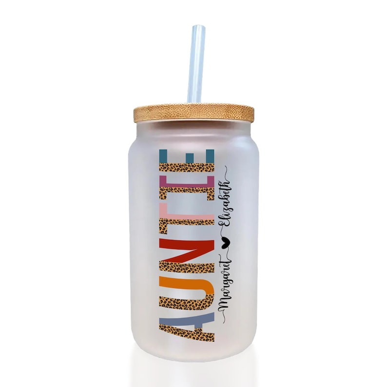 a white drink with a straw in it