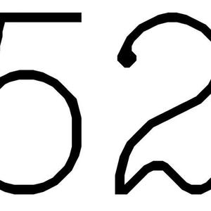 May include: Black digital clock display showing the time as 00:52. The numbers are in a bold, sans-serif font, with two dots separating the minutes and seconds.