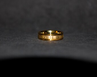 thumbnail image 2 of Stainless Steel Spinner Band Ring With Roman Numerals – Sizes 5 To 14 2 of 2