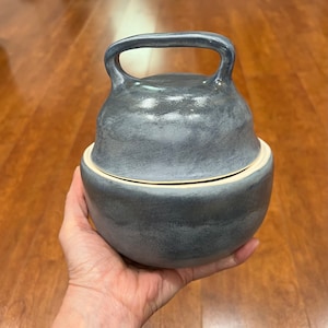 Blue mat handmade covered ceramic bowl