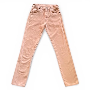 May include: A pair of high-waisted peach-colored denim jeans featuring a classic five-pocket design, a button fly closure, and visible copper-toned rivets at the pocket corners. The pants have a straight-leg cut with stitched seams.