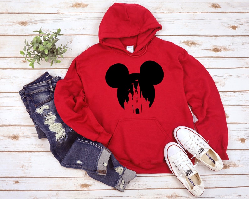 May include: Red hooded sweatshirt with a black silhouette of Mickey Mouse ears and the Disney castle inside the ears.