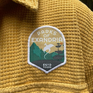 Écusson à logo des parcs de Wildemount