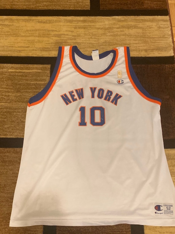 Walt Frazier New York Knicks Throwback Basketball Jersey.